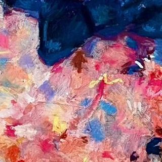 Baloo up close, cream and pink pastel against deep blue